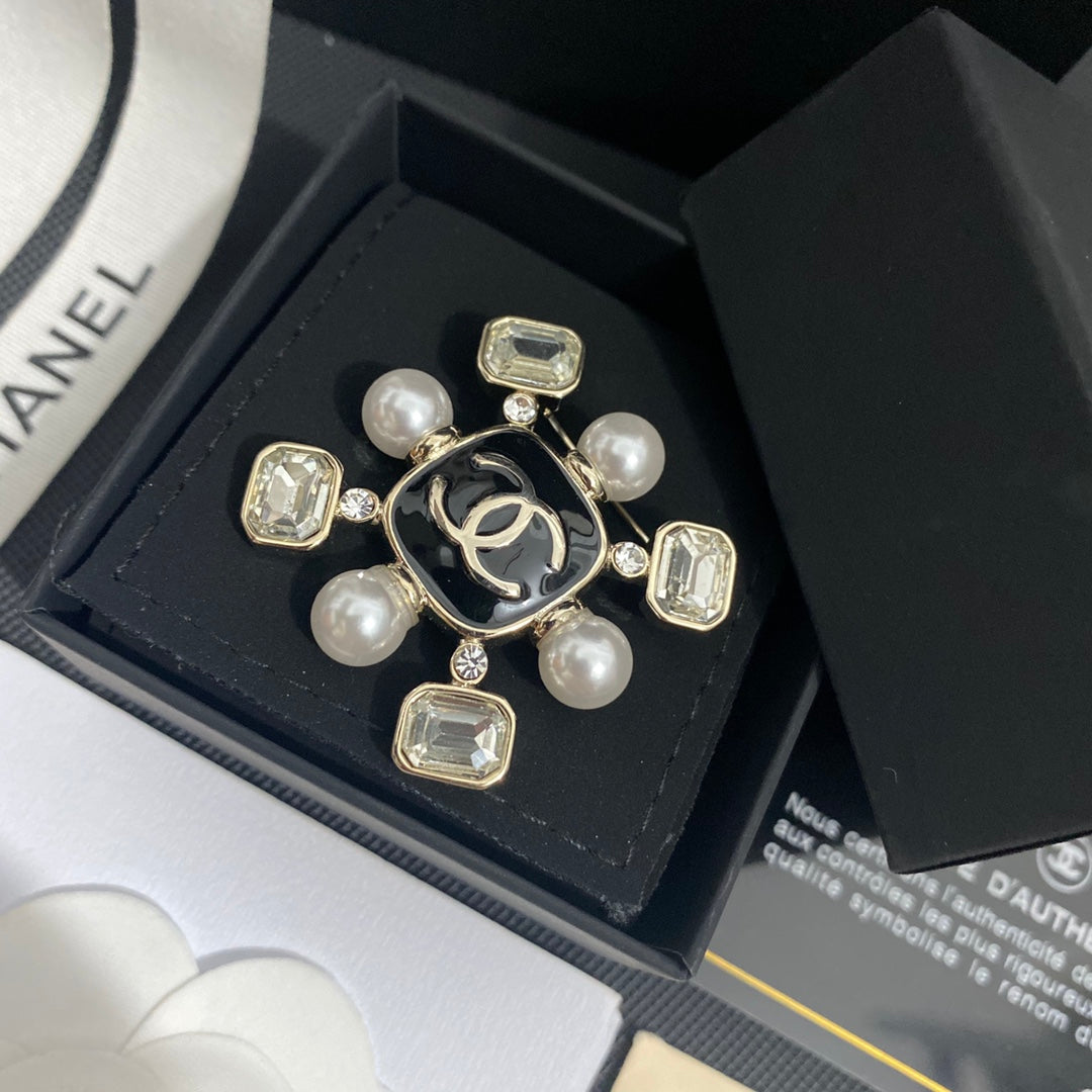 Elegant Gemstone and Pearl Brooch mysite