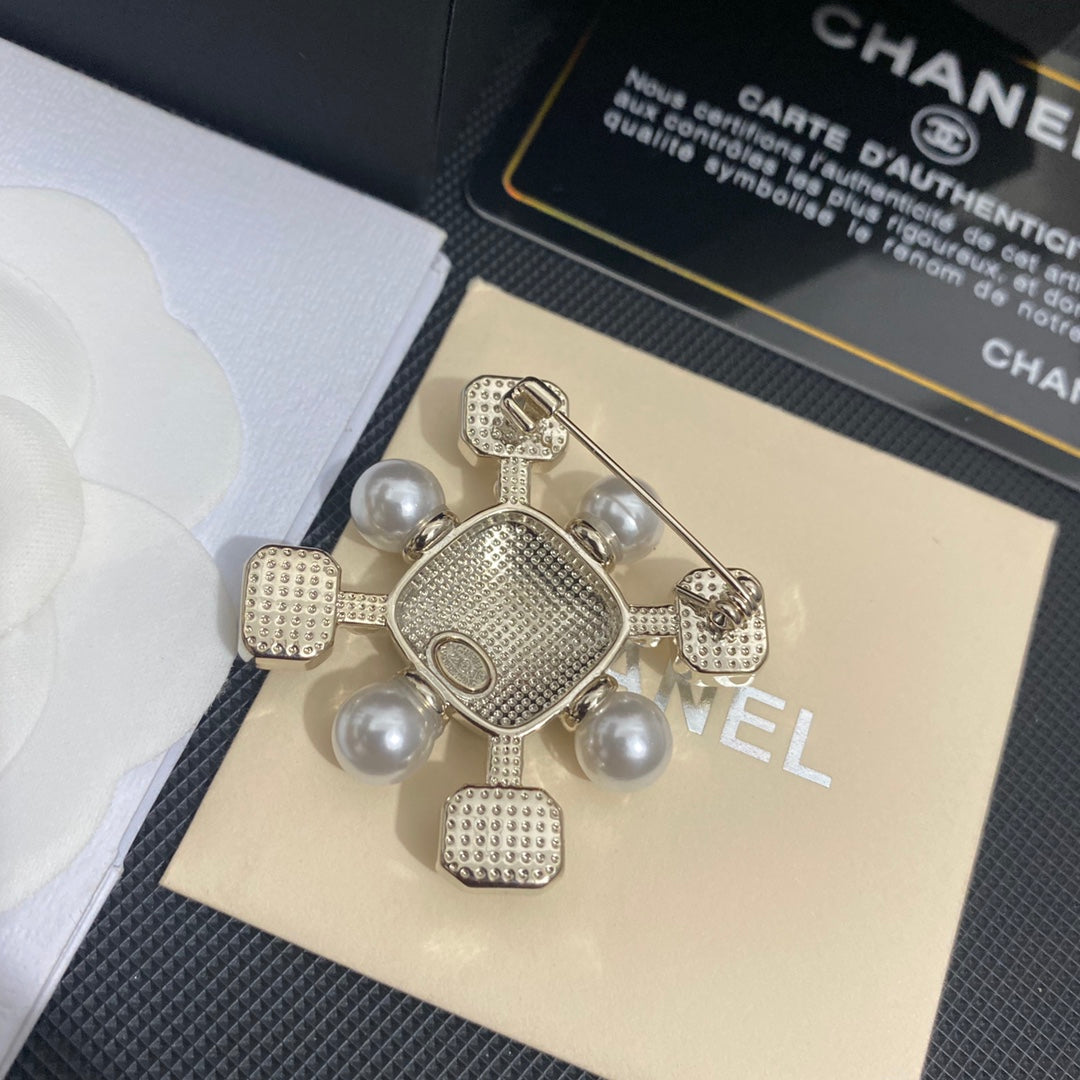 Elegant Gemstone and Pearl Brooch mysite