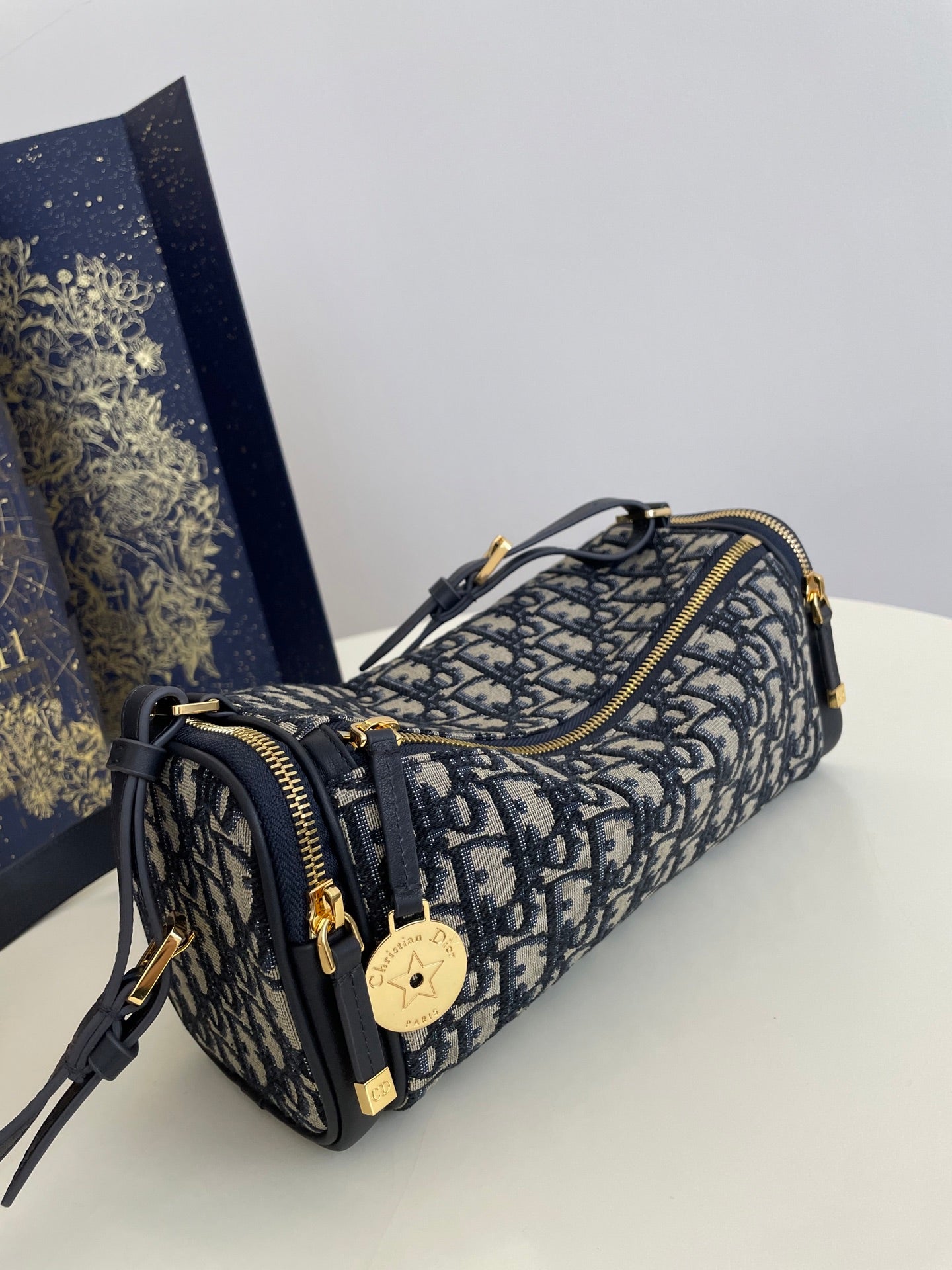 CD East-West cylindrical bag 27 blue jacquard canvas mysite